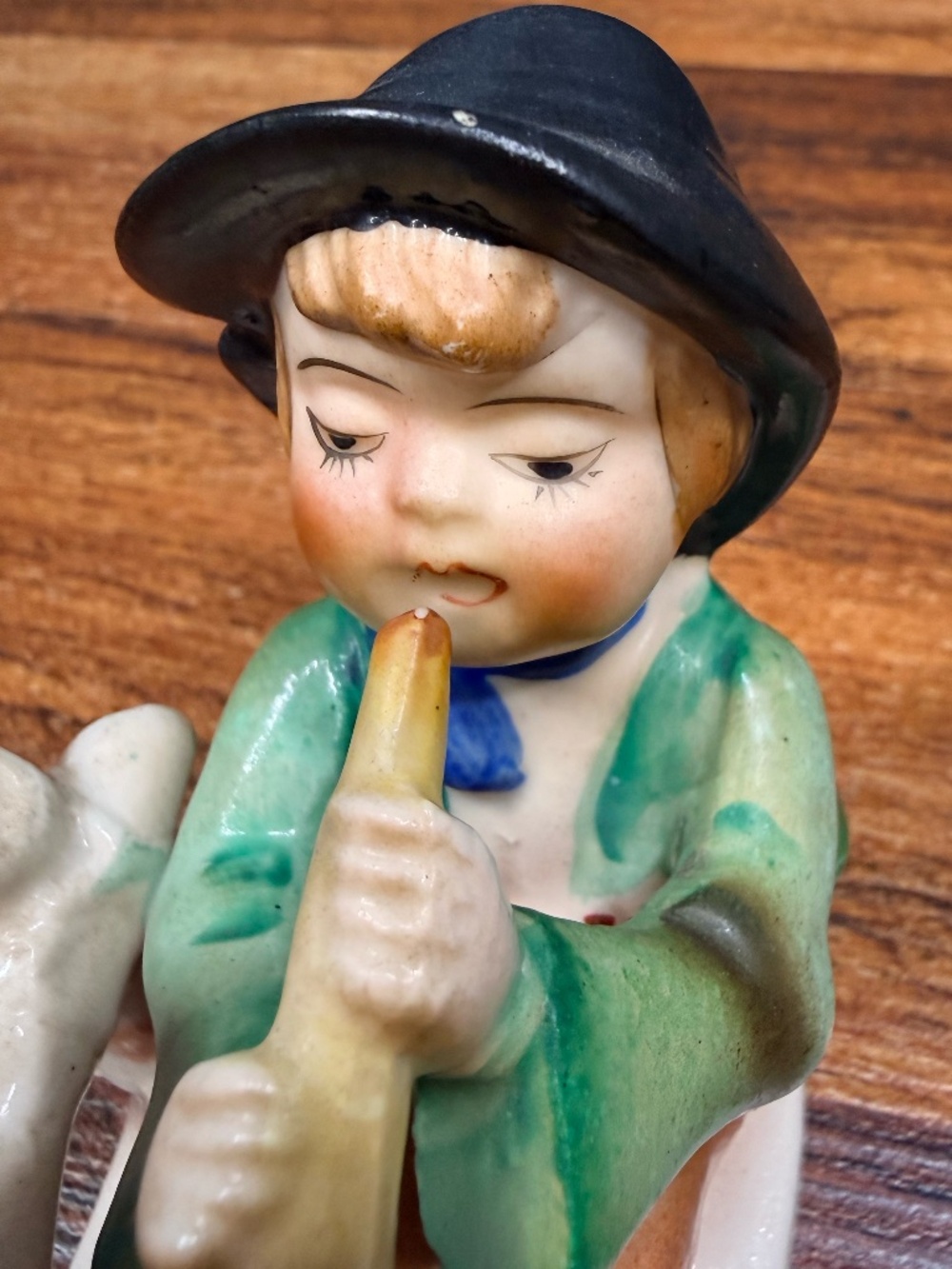 Figurine of Boy Playing Horn - Picture 6 of 15